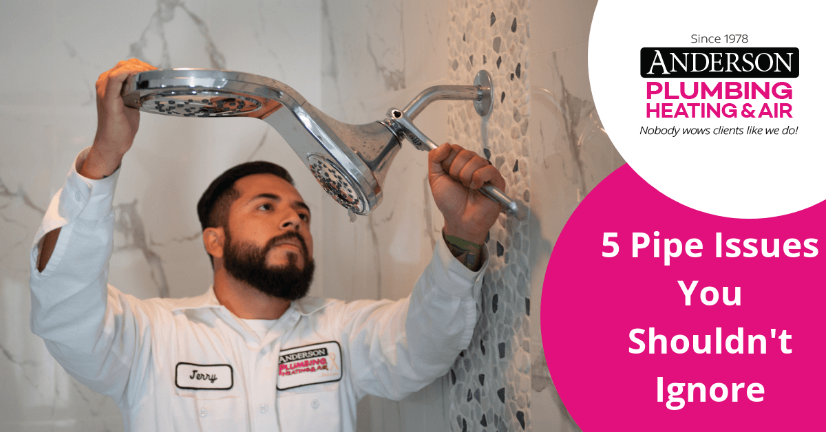 Bathroom plumbing technician repairing a shower fixture