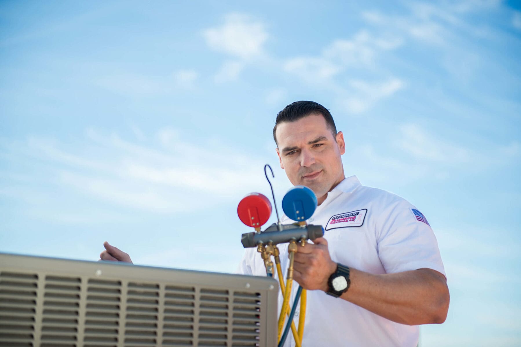 Technician with HVAC Guage