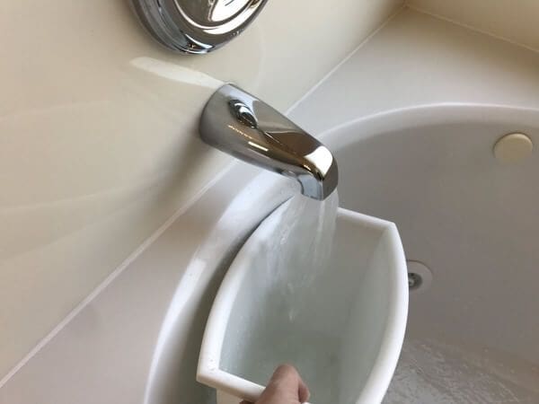 Filling Up Bucket with Hot Water